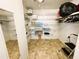Shelving and hanging space in this large closet at 408 Hawthorne Blvd, Leesburg, FL 34748
