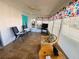 Comfortable sunroom with tiled flooring and plenty of natural light at 408 Hawthorne Blvd, Leesburg, FL 34748