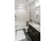 Well-lit bathroom featuring tile floors, tub-shower combo, and granite vanity at 414 Taft Dr, Davenport, FL 33837