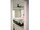 A cozy bedroom featuring a large window with modern décor at 414 Taft Dr, Davenport, FL 33837
