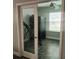 Exercise room with tiled flooring, fitness equipment, ceiling fan, and natural light at 414 Taft Dr, Davenport, FL 33837