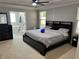 Spacious main bedroom with a Primary bath including a soaking tub and large windows at 414 Taft Dr, Davenport, FL 33837