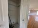 This is a look inside the closet with a view of the home's hardwood floor at 55808 Nan Dr, Astor, FL 32102