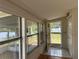 Inviting entryway with tile flooring, and a view of the waterfront at 55808 Nan Dr, Astor, FL 32102