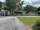 Exterior view of property featuring waterfront access at 55808 Nan Dr, Astor, FL 32102