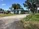 Waterfront home featuring a cozy porch area and private water access at 55808 Nan Dr, Astor, FL 32102