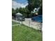 House exterior with street view, showing front yard and part of the house at 645 Cherry St, Daytona Beach, FL 32114