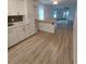 Modern kitchen with white cabinets and wood countertops at 645 Cherry St, Daytona Beach, FL 32114