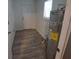 Laundry room with vinyl flooring and space for a refrigerator at 645 Cherry St, Daytona Beach, FL 32114