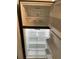 Inside view of a stainless steel refrigerator with multiple shelves and drawers at 645 Cherry St, Daytona Beach, FL 32114
