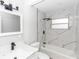 Beautifully renovated bathroom featuring modern tile work, sleek fixtures, and a soaking tub for relaxation at 708 Wynn Dr, Sanford, FL 32773
