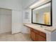 Bathroom with vanity, mirror, and tiled flooring at 7654 Sugar Bend Dr # 7654, Orlando, FL 32819