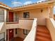 Exterior view of condo building with red tile roofs and balconies at 7654 Sugar Bend Dr # 7654, Orlando, FL 32819