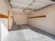 Spacious garage with overhead storage and ample space for parking and storage at 7654 Sugar Bend Dr # 7654, Orlando, FL 32819