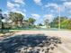 Outdoor basketball and tennis court with ample space at 7654 Sugar Bend Dr # 7654, Orlando, FL 32819