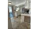 Bright kitchen with lots of natural light, modern appliances, and ample counter space at 103 Bougainvillea Dr, Leesburg, FL 34748