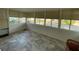 Sun-filled room with lots of light, multiple windows and neutral tile flooring at 103 Bougainvillea Dr, Leesburg, FL 34748
