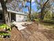 Charming brick patio area, perfect for outdoor relaxation and entertaining at 106 Royal Palm Dr, Leesburg, FL 34748