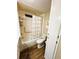 Bathroom featuring white vanity with marble top, toilet, and bathtub with shower at 106 Royal Palm Dr, Leesburg, FL 34748