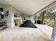 Large covered area offering versatile space for storage and recreation at 106 Royal Palm Dr, Leesburg, FL 34748