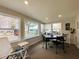 Comfortable sunroom with table and chairs, lots of light, and relaxing atmosphere at 106 Royal Palm Dr, Leesburg, FL 34748