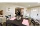 Dining and seating area with lots of natural light and view to rest of the house at 106 Royal Palm Dr, Leesburg, FL 34748