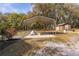 Metal carport and storage shed providing ample space for vehicles and equipment at 1107 Linmar Ave, Fruitland Park, FL 34731