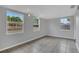 A spacious room featuring tile floors and well-lit windows that brighten the space at 1134 Norwood Dr, Deltona, FL 32725