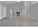 Dining area showcasing tile floors and a modern table set for four, with natural light at 1134 Norwood Dr, Deltona, FL 32725