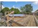 Backyard swimming pool has a wood deck and steps; ready for fun and relaxation at 1134 Norwood Dr, Deltona, FL 32725