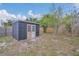 A quaint storage shed in the backyard for convenience at 1134 Norwood Dr, Deltona, FL 32725