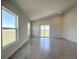 Bright living room with neutral paint, recessed lighting, and sliding glass doors to the yard at 1212 Caloosa Ridge Ave, Babson Park, FL 33827