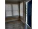 A sunny entryway features two bright windows, and wood-look floors at 134 Daytona Ave, Daytona Beach, FL 32117