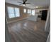 Spacious living room with wood-look flooring, and ample natural light at 134 Daytona Ave, Daytona Beach, FL 32117