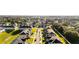 Expansive aerial perspective of the neighborhood featuring neatly arranged townhomes and landscaping at 1412 Mirabella Cir, Davenport, FL 33897