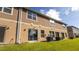 Exterior view of home featuring a well-maintained lawn and siding at 1412 Mirabella Cir, Davenport, FL 33897