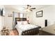 Bedroom featuring a dark wood bed frame and matching furniture at 1412 Mirabella Cir, Davenport, FL 33897