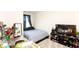 Bedroom featuring a bed, desk, TV, and window at 1412 Mirabella Cir, Davenport, FL 33897