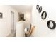 Upstairs hallway featuring decor and leading to bedrooms and living areas at 1412 Mirabella Cir, Davenport, FL 33897