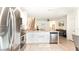 Modern kitchen featuring stainless steel appliances, granite countertops, and an open floor plan at 1412 Mirabella Cir, Davenport, FL 33897