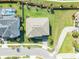 Aerial view of a single-Gathering home with a large backyard and an extended driveway at 1447 Myrtle Oaks Trl, Oviedo, FL 32765