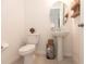 Powder room features a pedestal sink and neutral tones at 1447 Myrtle Oaks Trl, Oviedo, FL 32765
