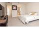 Bright bedroom features neutral colors, carpet, and a flatscreen TV at 1447 Myrtle Oaks Trl, Oviedo, FL 32765