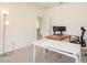Office/bedroom featuring light walls, desk and chair and access to a second floor hallway at 1447 Myrtle Oaks Trl, Oviedo, FL 32765