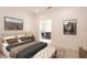 Bedroom featuring neutral walls, carpet, and views of dining and kitchen at 1447 Myrtle Oaks Trl, Oviedo, FL 32765