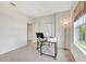 Bright room with a window, featuring desk and chair set and neutral carpeting at 1447 Myrtle Oaks Trl, Oviedo, FL 32765