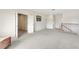 Bonus room features carpet and three entry doors at 1447 Myrtle Oaks Trl, Oviedo, FL 32765