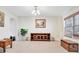 Bright living room with neutral colors, carpet, and ample natural light at 1447 Myrtle Oaks Trl, Oviedo, FL 32765