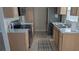 Modern kitchen featuring stainless steel appliances and light wood cabinets at 1617 Shady Ridge Ct # 257, Orlando, FL 32807