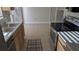 Galley kitchen with stainless steel appliances and light countertops at 1617 Shady Ridge Ct # 257, Orlando, FL 32807